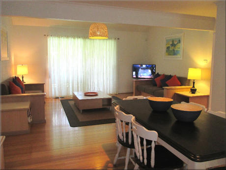 The living room in Gannet Deluxe Villa at Raffertys Resort